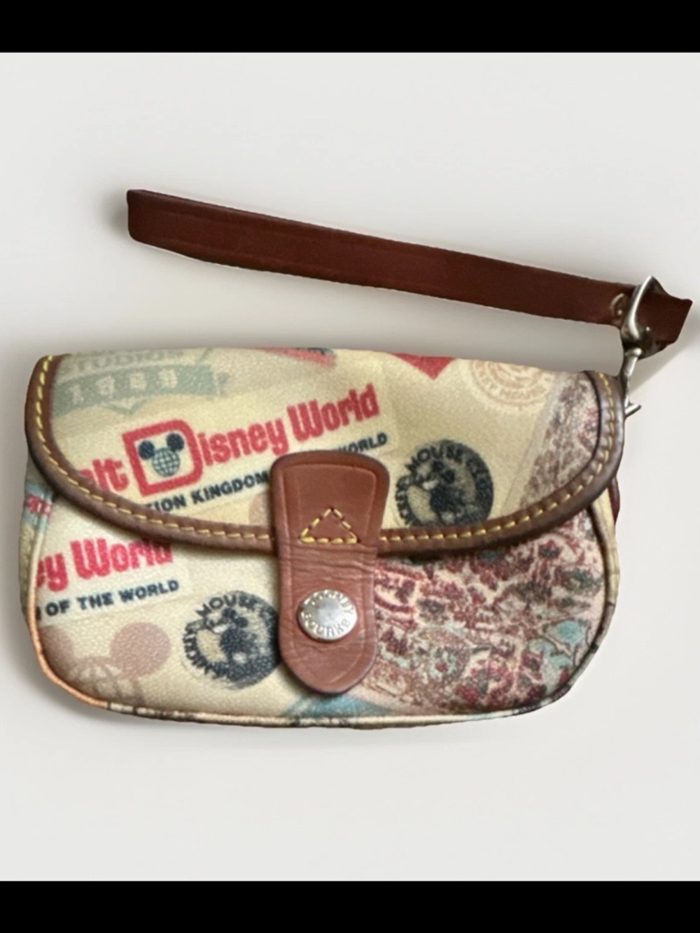 Dooney & Bourke 2011 Beige Canvas Disney World Wristlet with Brown Leather Trim